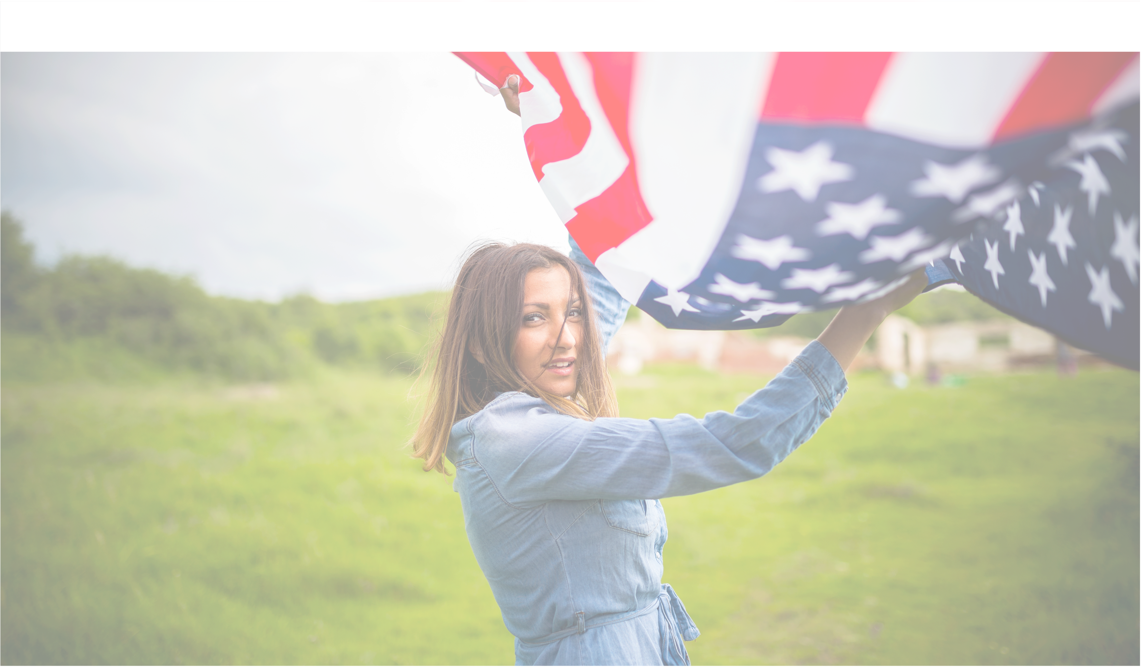 A woman holding an American flag